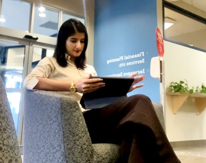 Jagdeep working in a corporate office in Canada
