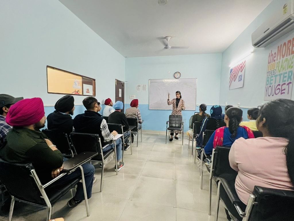 Jagdeep training a group of learners in India