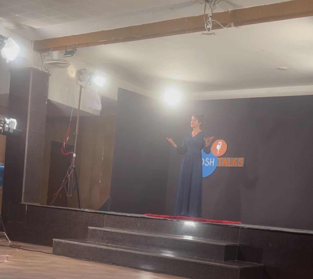 Jagdeep speaking on the Josh Talks stage